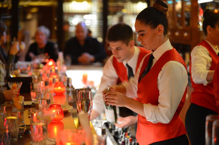 Bartenders making cocktails